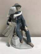 A Lladro figurine : The Kiss, model 4888, height 32 cm, boxed.