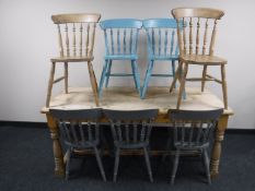 A Victorian style pine dining table and seven chairs