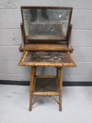 A Victorian mahogany cabinet, a two tier trolley,