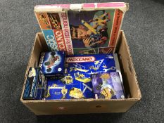 A box containing Meccano model making kits