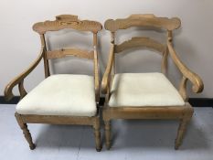 Two light pine armchairs