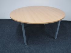 A circular pine topped office table and two square office tables