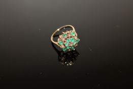 A 9ct gold emerald and diamond cluster ring, size N CONDITION REPORT: 3.2g.