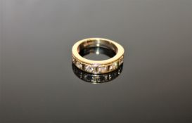 18ct half eternity ring with eight stones 5.2 grams CONDITION REPORT: Ring size J.