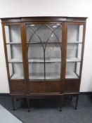 An Edwardian inlaid mahogany break-front display cabinet