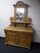 An early 20th century oak mirror back sideboard