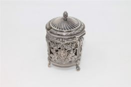 An 18th century French ornate silver mustard pot,