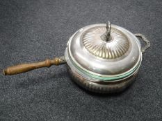 A silver plated dish with cover