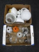 Two boxes of vintage oil lamp parts, glass shades etc.