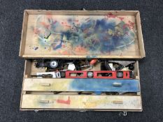 A joiner's tool box of assorted hand tools