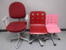 A swivel office armchair and two Ikea typists chairs