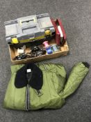 A box of fishing equipment - reels, lines,