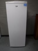 A Beko upright freezer
