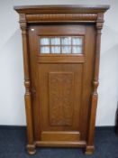A continental oak cabinet with pillar supports