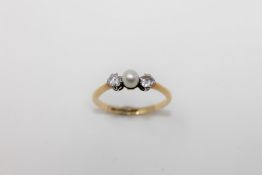 An 18ct gold pearl and diamond ring.