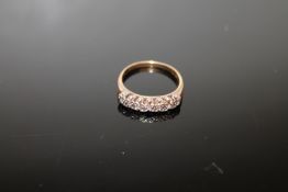 A diamond set half eternity ring, size N CONDITION REPORT: 2.