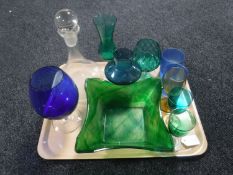 A tray containing a collection of 20th century coloured glass,