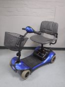 A Shop Rider mobility cart with key and charger