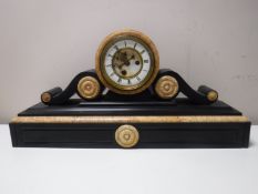 A Victorian marble mantel clock