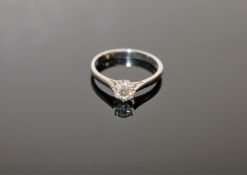 An 18ct white gold solitaire diamond ring