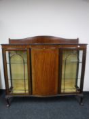 An early 20th century mahogany display cabinet