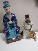 Two pottery figures,