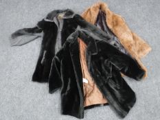 A coney fur coat and two simulated fur coats
