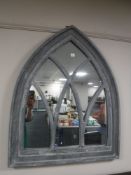 A Gothic arch topped mirror