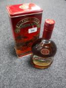 A 75cl bottle of Appleton Estate Jamaican rum in tin