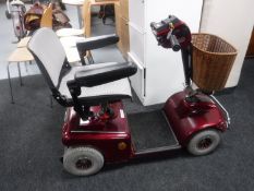 A Shop Rider mobility cart with charger and keys