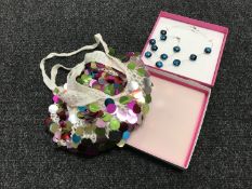 A boxed costume necklace and bracelet set together with a handbag