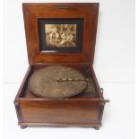 Victorian walnut cased table top Polyphon musical disc player,