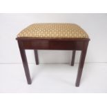 Mahogany piano stool with compartment. 52cm high.