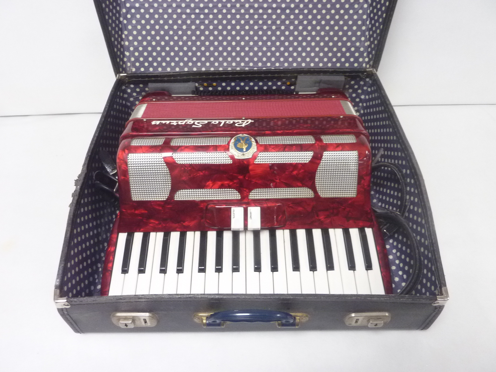 Paolo Soprani thirty-four key, seventy-two bass piano accordion, in marbled red,