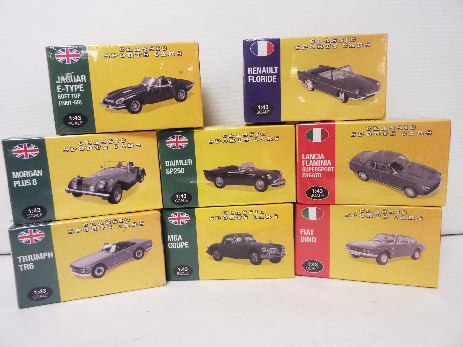 Eight Atlas Editions 1:43 scale classic sports cars including Jaguar E-type, Morgan Plus 8,