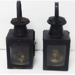 Two B.R. Railway paraffin hand lamps, impressed logo to square tin body.