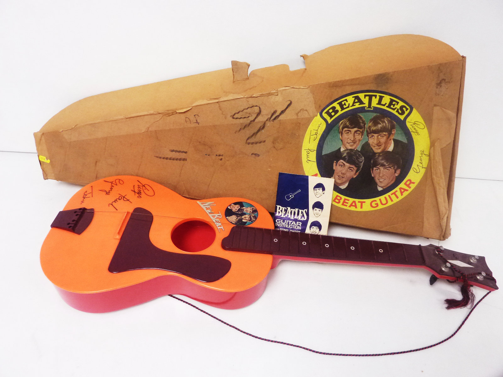 The Beatles - Selcol "New Beat" guitar in original box and song sheet.