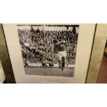 FOOTBALL, signed piece by Geoff Hurst, overmounted with photo heading ball for England (probably