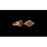 Roman Style Gold Ring with Charging Bull Intaglio.