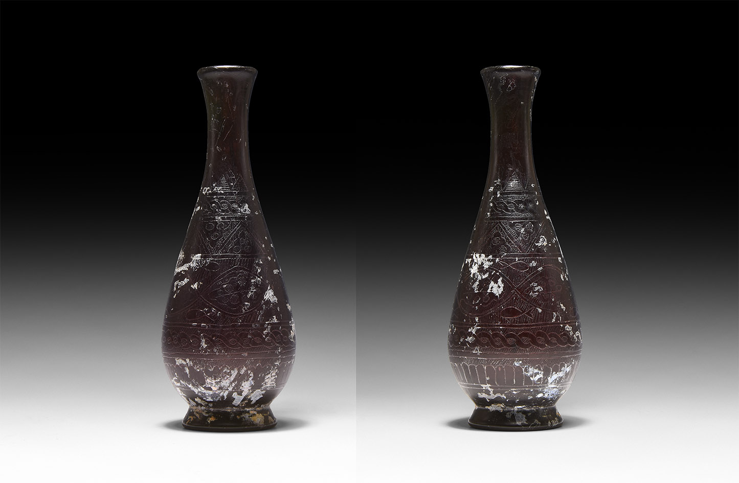 Abbasid Engraved Glass Bottle