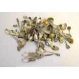 Quantity of silver and other tourist spoons & pair of grape scissors ( 360g tested included)