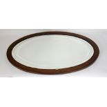 Oak oval mirror with bevel edged glass