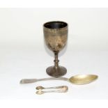 Silver trophy cup and silver serving spoon. hallmarked London