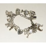 Silver charm bracelet and 13 charms