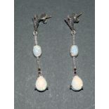 Pair of silver and opal drop earrings in the art deco style