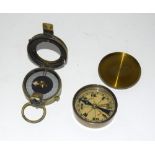 A WW1 Swiss made British Army marching compass dated 1915 and a brass cased compass 6cms diameter
