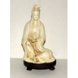 Carved Oriental figure Guanyin