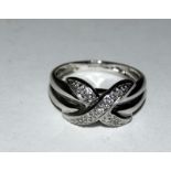 9ct white gold ladies Diamond cross over ring size L