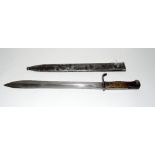 A WW1 German Mauser butcher bayonet in its steel scabbard. Makers names to blade H.MUNDLOSS & Co.