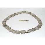 Nickel silver Art Nouveau style belt, 111cm long, together with a propelling pencil